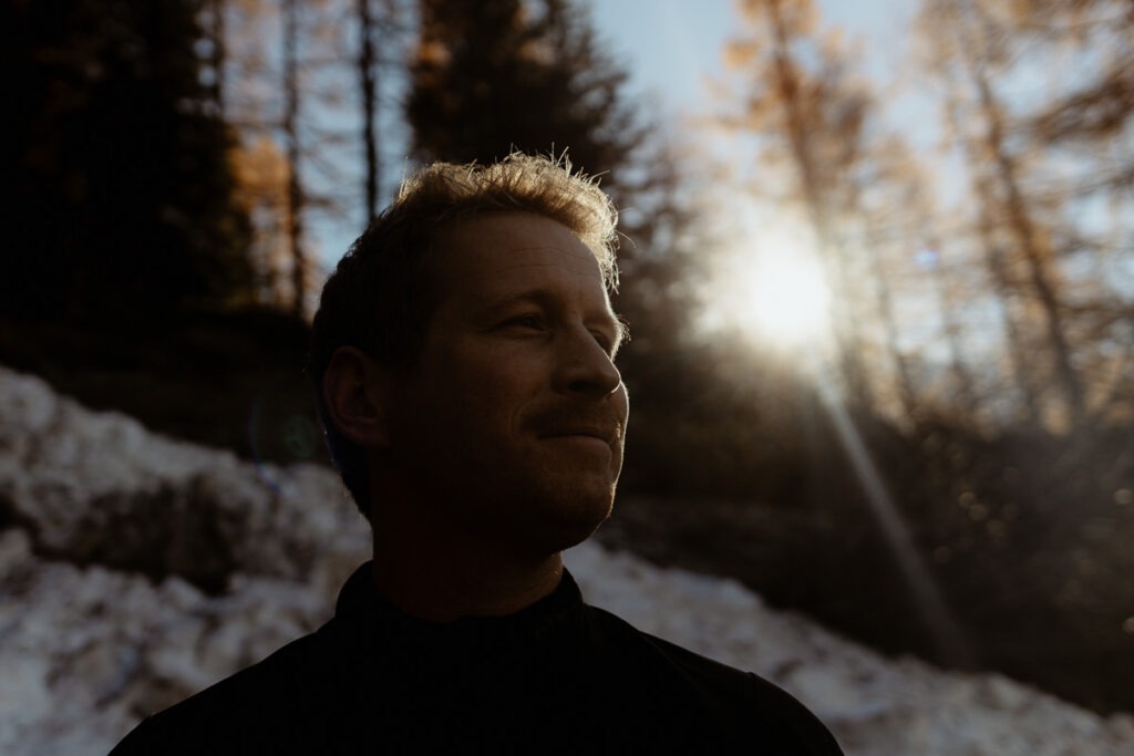 A man in a black shirt standing on Brorrick Mountain.
