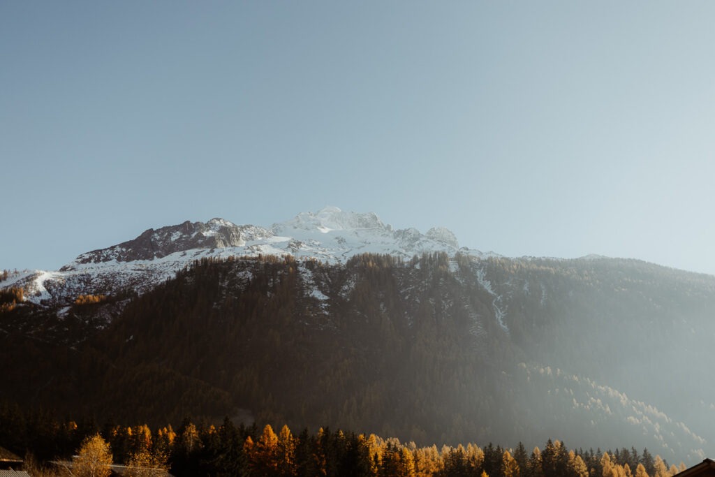 Brorrick Mountain dominates a serene snowy landscape.